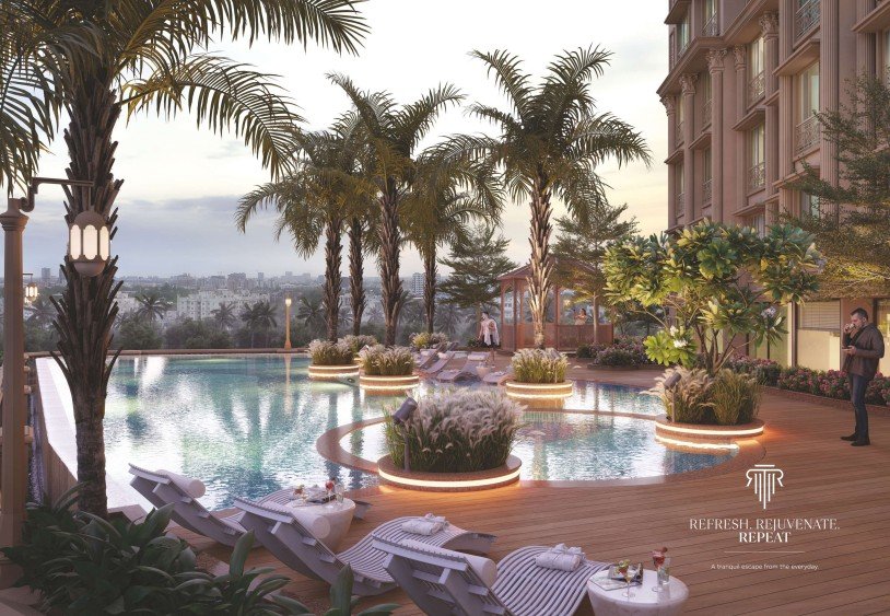 Luxury swimming pool with premium amenities at Raj Legacy Satyam – RAJ LEGACY SATYAM MIRA ROAD EAST . NEAR SAI KARISHMA COMPLEX . KANAKIA . RAJ REALTORS RAJ LEGACY 1 . SATYAM A . SATYAM B . MIRA ROAD EAST